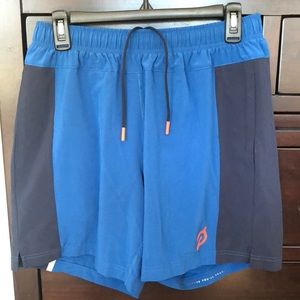 Like New! Mens medium Fourlaps x Peloton athletic shorts